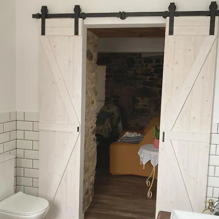 En Casa Oliveros, Razo *