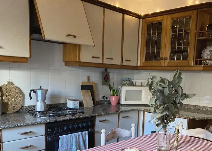 En Casa Oliveros, Razo *